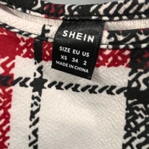 A extra small dress never been worn brand new from Shine